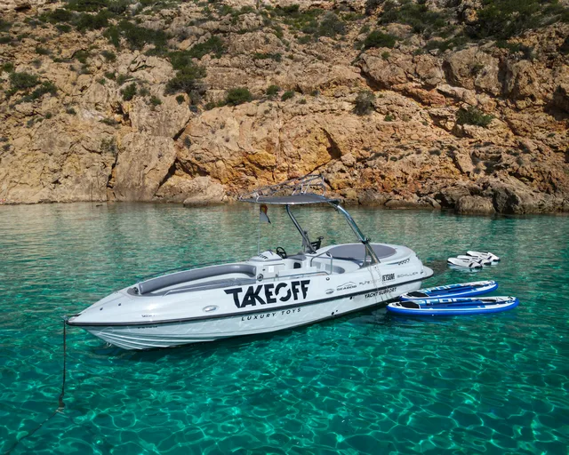 Boat in a turquoise cove