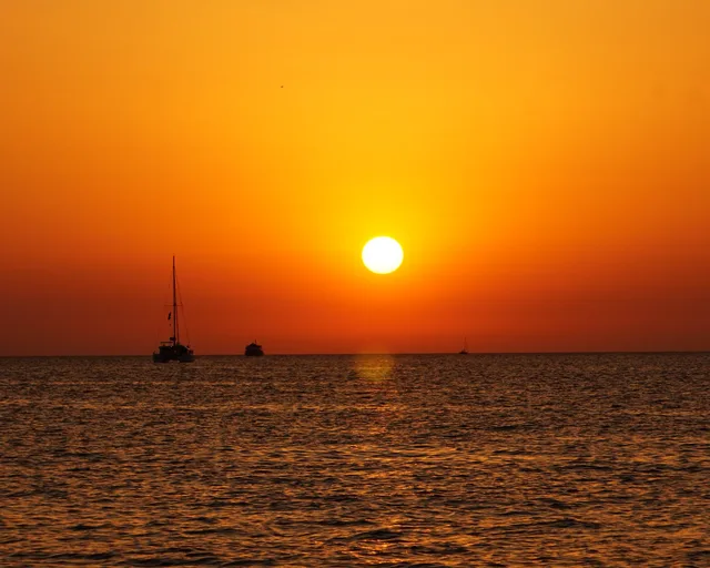 Sailboats at sunset on the sea