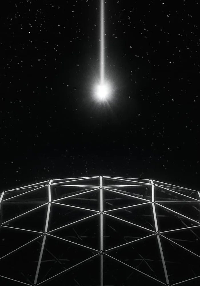 Geodesic dome lit up in the dark during a party